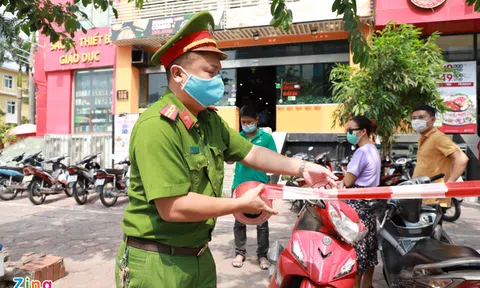 Phong tỏa quán pizza có ca nghi nhiễm Covid-19 ở Hà Nội